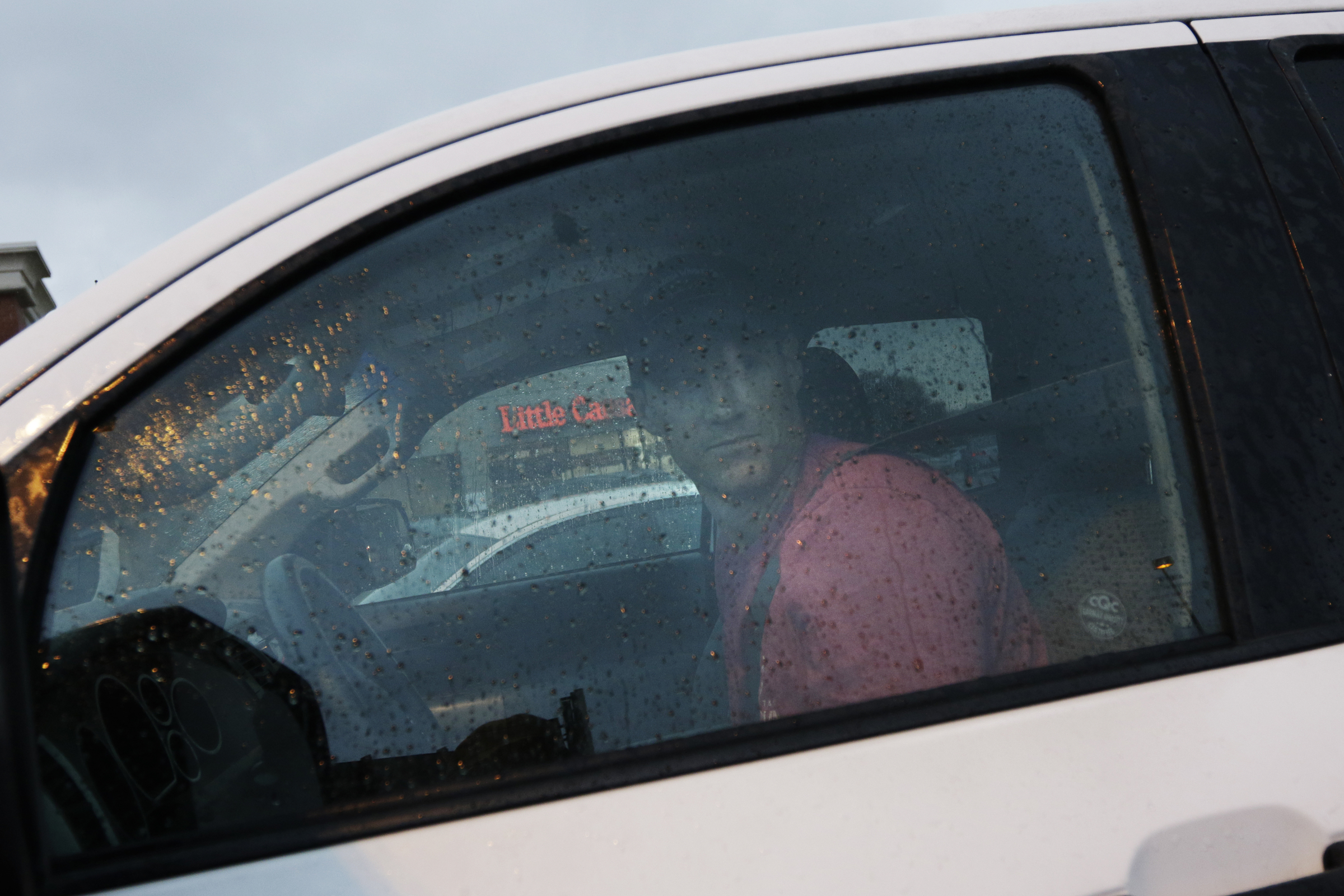 Andy Johnson drives through parking lots along Tennessee Highway 153 searching for missing CSAS 2nd grade teacher John Eaton's silver Kia Sedona on Tuesday, Nov. 7, 2017, in Chattanooga, Tenn. Eaton left home on Sunday for the school but never returned. Volunteers searched Eaton's typical route from Sequoyah Access Road along U.S. Highway 27, Tennessee Highway 153, DuPont Parkway, and Amnicola Highway to the school.