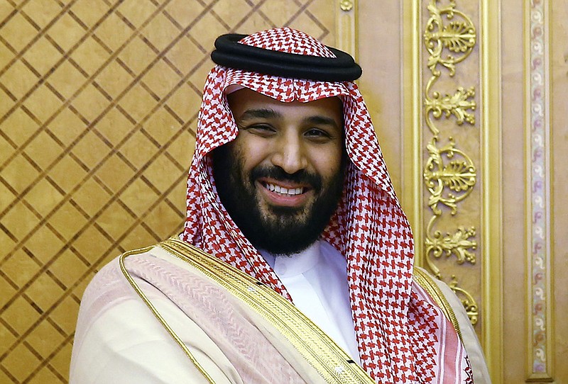 In this July, 23, 2017 file photo, Saudi Crown Prince Mohammed bin Salman poses while meeting with Turkey's President Recep Tayyip Erdogan in Jiddah, Saudi Arabia. Saudi Arabia's King Salman on Saturday, Nov. 11 2017, removed a prominent prince who headed the National Guard, replaced the economy minister and announced the creation of a new anti-corruption committee. (Presidency Press Service/Pool Photo via AP, File)