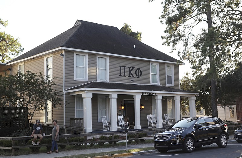 In this photo taken Nov. 3, 2017, Florida State University's Pi Kappa Phi fraternity house near the FSU campus in Tallahassee, Fla., is viewed. Florida State President John Thrasher announced during a news conference at FSU on Monday the suspension of all Greek life activities at the university following the death at a Pi Kappa Phi fraternity pledge. (Joe Rondone/Tallahassee Democrat via AP)

