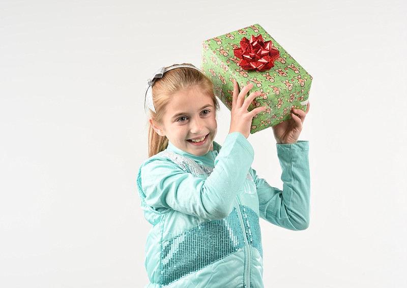 Thrasher Elementary student Tally Pierce, 8, is the winner of the Time Free Press Holiday Wrapping Paper Contest.