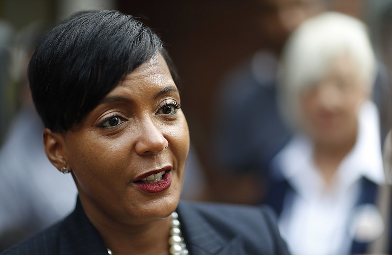 In this Tuesday, Nov. 7, 2017, file photo, Atlanta city councilwoman and mayoral candidate Keisha Lance Bottoms talks to the press after voting at a polling site in Atlanta.