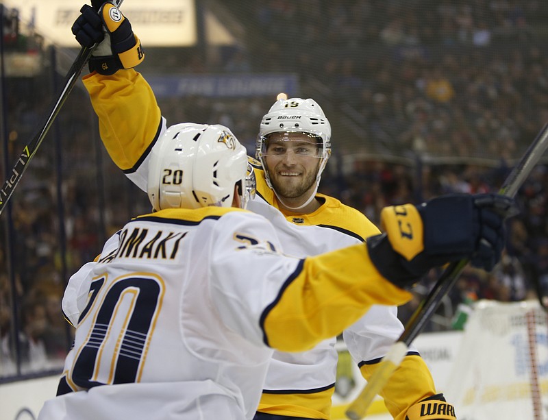 Nashville Predators' Calle Jarnkrok, of Sweden, celebrates his goal against the Columbus Blue Jackets during the third period of an NHL hockey game Tuesday, Nov. 7, 2017, in Columbus, Ohio. The Predators won 3-1. (AP Photo/Jay LaPrete)