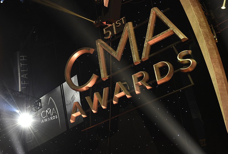 Signage for the 51st annual CMA Awards appears in lights at the Bridgestone Arena on Wednesday, Nov. 8, 2017, in Nashville, Tenn. (Photo by Chris Pizzello/Invision/AP)