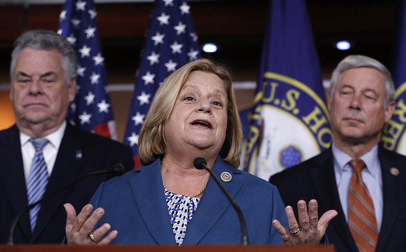 
              Rep. Ileana Ros-Lehtinen, R-Fla., flanked by Rep. Peter King, R-N.Y., left, and Rep. Fred Upton, R-Mich., join a group of Republican lawmakers to encourage support for the Deferred Action for Childhood Arrivals (DACA) program?, during a news conference on Capitol Hill in Washington, Thursday, Nov. 9, 2017. (AP Photo/J. Scott Applewhite)
            