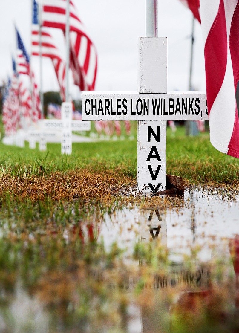 Crosses that anchor American flags line Robin Road in Ringgold, Ga., Wednesday Nov. 8, 2017. This tradition of honoring deceased veterans began in 1970 with Ringgold's Veterans of Foreign Wars of the United States, Post 8153.