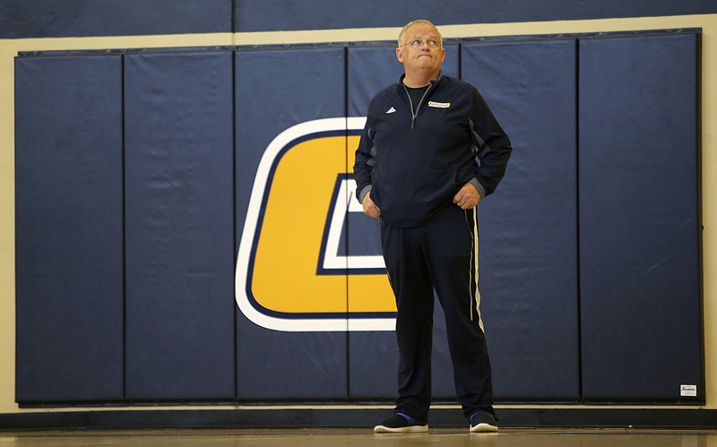 UTC head coach Jim Foster looks towards the scoreboard during practice at the Chattem Basketball Practice Facility on the campus of the University of Tennessee at Chattanooga on Tuesday, Oct. 31, 2017 in Chattanooga, Tenn.