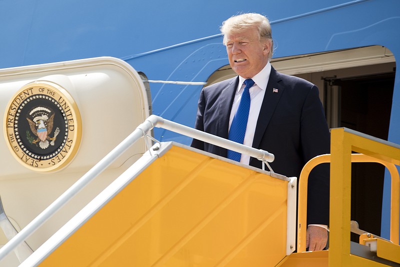 President Donald Trump arrives at Danang International Airport, Friday, Nov. 10, 2017, in Danang, Vietnam. Trump is on a five country trip through Asia traveling to Japan, South Korea, China, Vietnam and the Philippines. (AP Photo/Andrew Harnik)