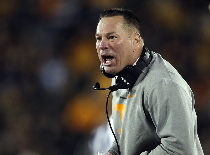 Tennessee head coach Butch Jones yells from the sideline during the first half of an NCAA college football game against Missouri, Saturday, Nov. 11, 2017, in Columbia, Mo. (AP Photo/Jeff Roberson)