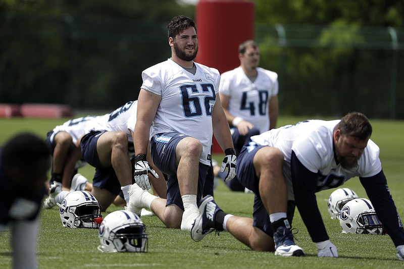 Tennessee Titans offensive lineman Corey Levin takes a break during an offseason workout in May in Nashville. Levin was a standout at UTC before being taken in the sixth round of the NFL draft this past spring.