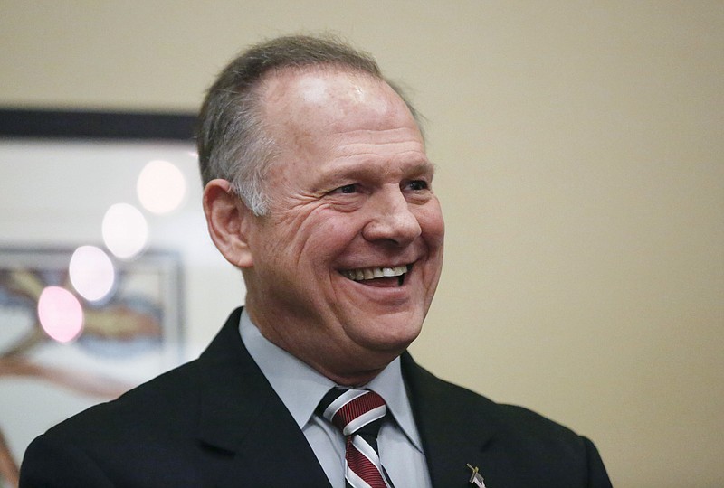 Former Alabama Chief Justice and U.S. Senate candidate Roy Moore waits to speak the Vestavia Hills Public library, Saturday, Nov. 11, 2017, in Birmingham, Ala. According to a Thursday, Nov. 9 Washington Post story an Alabama woman said Moore made inappropriate advances and had sexual contact with her when she was 14. Moore has denied the allegations. (AP Photo/Brynn Anderson)