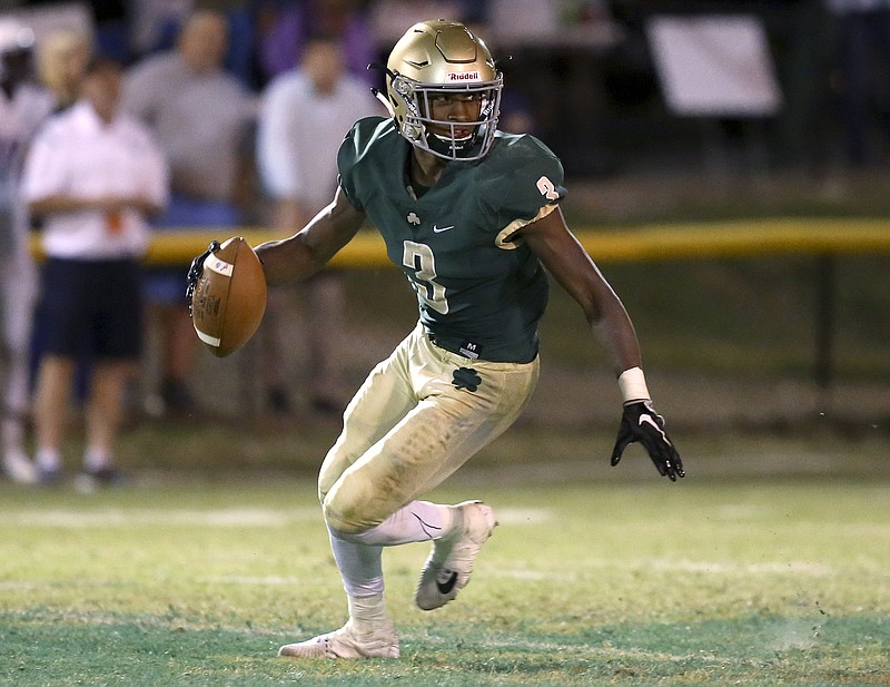 Notre Dame's Cameron Wynn (3) scrambles against Central at Notre Dame's Jim Eberle Field on Friday, Sept. 8, in Chattanooga, Tenn.