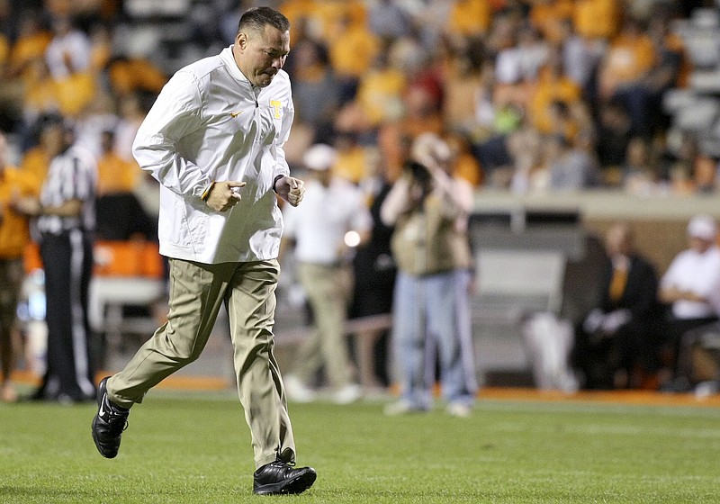 Tennessee head coach Butch Jones makes his way to the locker room after warmups before an NCAA football game against Southern Mississippi at Neyland Stadium on Saturday, Nov. 4, 2017 in Knoxville, Tenn.