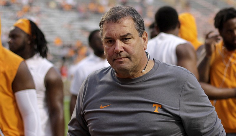 Tennessee associate head coach and defensive line coach Brady Hoke makes his way back to the locker room before an NCAA football game between Tennessee and Southern Mississippi at Neyland Stadium on Saturday, Nov. 4, 2017, in Knoxville, Tenn.