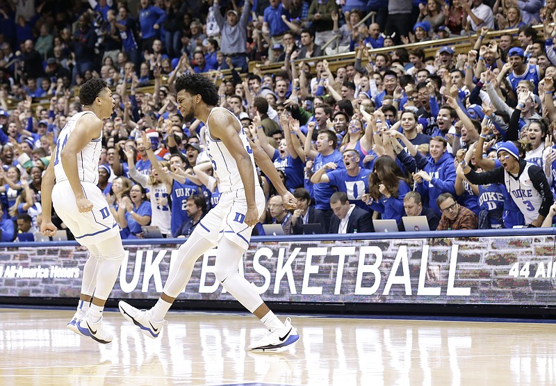 Duke's Jordan Goldwire and Marvin Bagley III, right, react during the first half of an NCAA college basketball game against Utah Valley in Durham, N.C., Saturday, Nov. 11, 2017. (AP Photo/Gerry Broome)