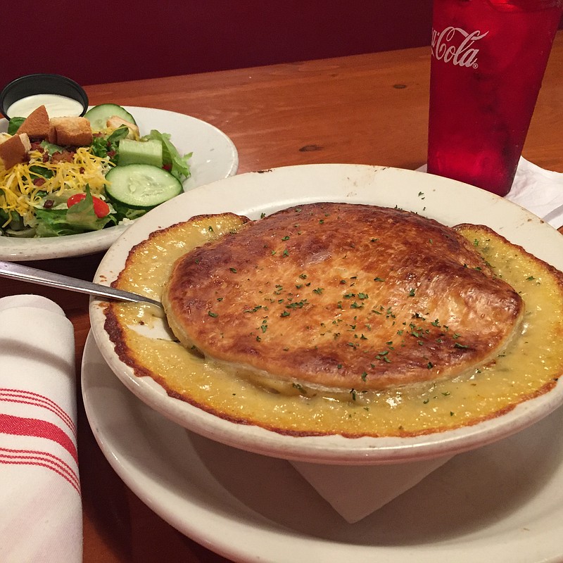 Order one of Bones Smokehouse's chicken potpies and two salads and you've got dinner for two. The 6-inch potpie can easily serve two people.