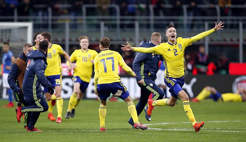 Sweden's players celebrate at the end of the World Cup qualifying play-off second leg soccer match between Italy and Sweden, at the Milan San Siro stadium, Italy, Monday, Nov. 13, 2017. The match ended in a 0-0 draw and Sweden earns a bench to the World Cup. (AP Photo/Antonio Calanni)