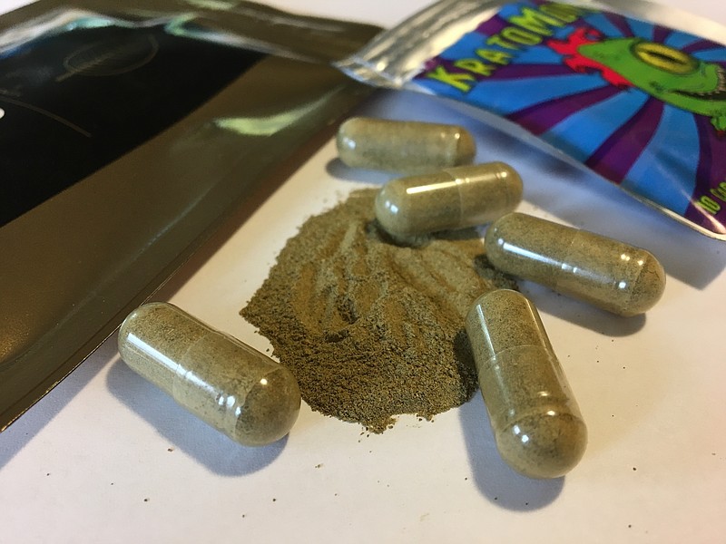 FILE - In this Sept. 27, 2017, file photo, kratom capsules are displayed in Albany, N.Y. Federal health authorities on Tuesday, Nov. 14, are warning about reports of injury, addiction and death with the herbal supplement that has been promoted as an alternative to opioid painkillers and other prescription drugs. (AP Photo/Mary Esch, File)