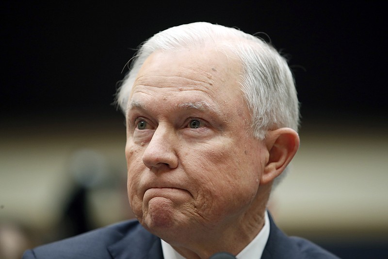 Attorney General Jeff Sessions listens during a House Judiciary Committee hearing on Capitol Hill, Tuesday, Nov. 14, 2017 in Washington. Sessions is leaving open the possibility that a special counsel could be appointed to look into Clinton Foundation dealings and an Obama-era uranium deal. The Justice Department made the announcement Monday in responding to concerns from Republican lawmakers. (AP Photo/Alex Brandon)