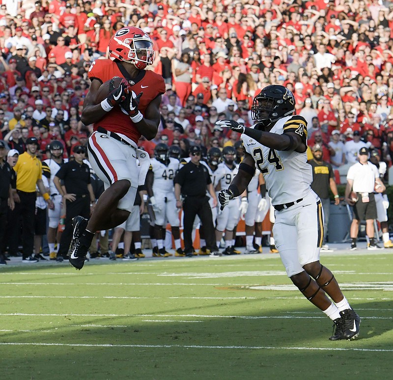 Georgia senior receiver Javon Wims comes down with a reception during the 31-10 season-opening win over Appalachian State. Wims leads the No. 7 Bulldogs in catches this season heading into his Sanford Stadium finale Saturday afternoon against Kentucky.