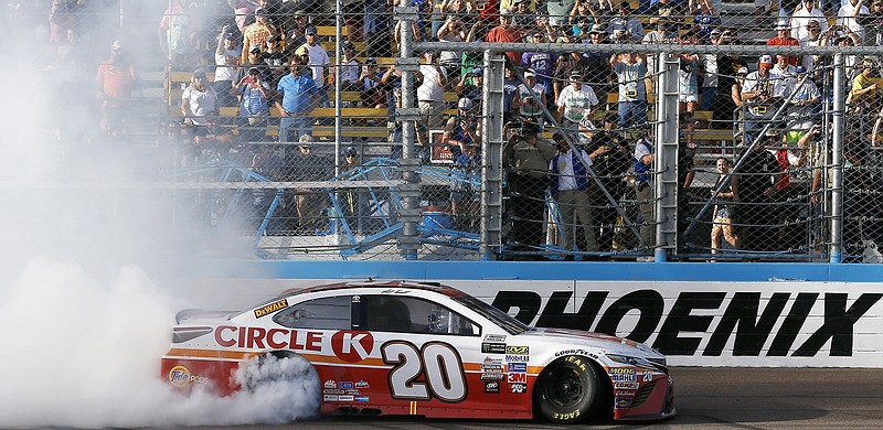 Matt Kenseth celebrates with a burnout at the finish line this past Sunday after winning the NASCAR Cup Series race at at Phoenix International Raceway. Kenseth, 45, has 39 victories in 20 seasons on the top-tier circuit. He won the 2003 season championship.