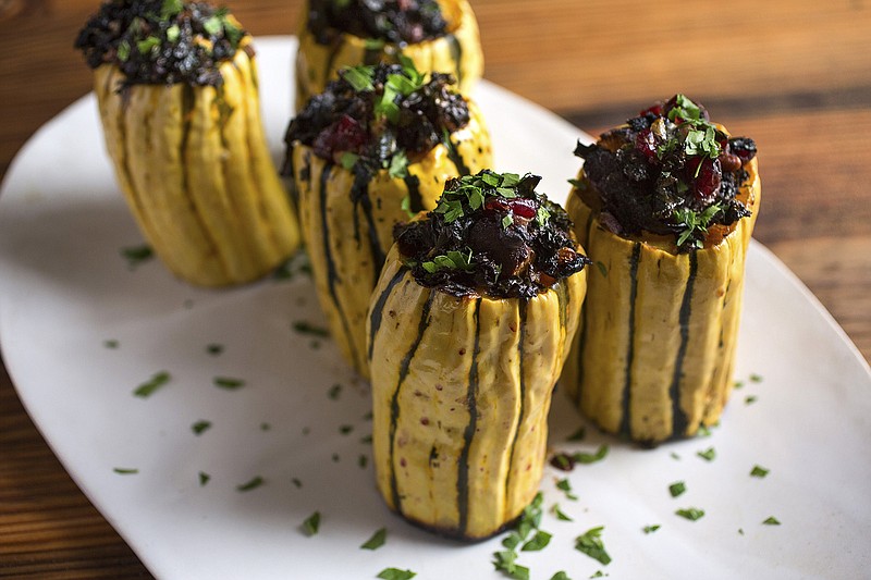 You could use small sugar pumpkins, or any sweet-fleshed winter squash, but delicata squash is our favorite for roasting and stuffing for reasons of taste and beauty.