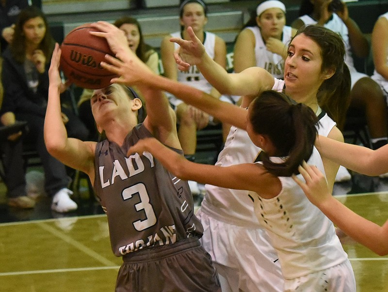 Soddy-Daisy's Emilee Dent (3) fights for possession as Notre Dame's Elisa Alvarado and Julia Raabe mix it up near the end of the first half Thursday, Nov. 17, at Notre Dame.