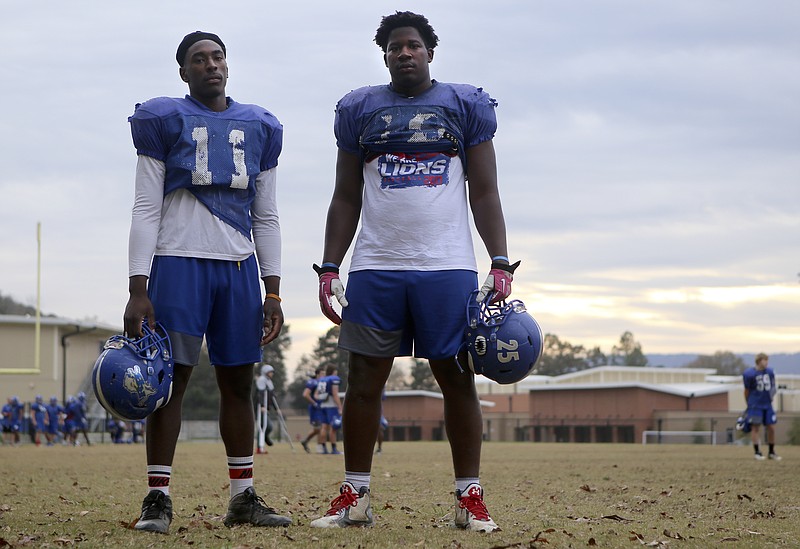 Red Bank defensive linemen Ivan Young, left, and Jamel Davis pose during practice at Red Bank High School on Wednesday, Nov. 15, 2017 in Chattanooga, Tenn.