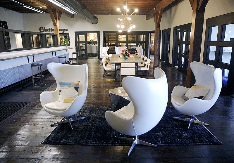 Real Estate Partners' new Main Street office sports an open atmosphere with a variety of work spaces, conference rooms and lounging areas for agents to handle their sales and meet with clients.