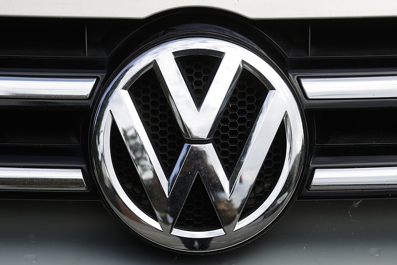 FILE - This Tuesday, Aug. 1, 2017, file photo shows the brand logo of German car maker Volkswagen on a car in Berlin. U.S. safety regulators are investigating complaints that a Volkswagen recall may not fix a wiring problem that can stop the front driver’s air bag from inflating in a crash. The government probe covers nearly 416,000 vehicles including the 2010 to 2014 CC and Passat, the 2010 to 2013 Eos, the 2011 to 2014 Golf, GTI, Jetta and Tiguan, and the 2012 to 2014 Jetta Sportwagen. (AP Photo/Markus Schreiber, File)