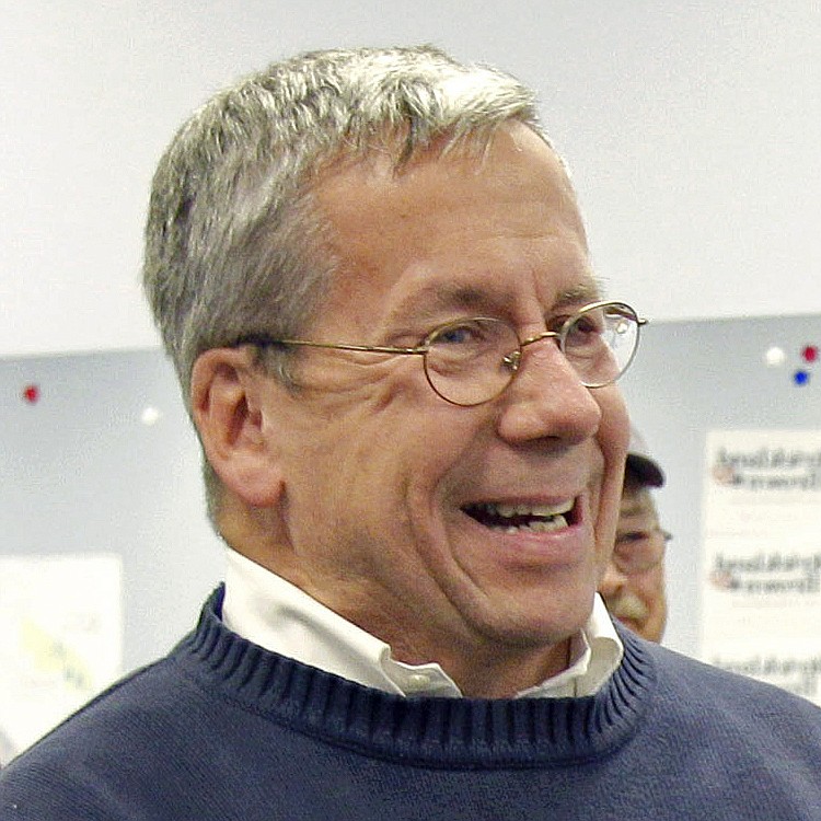 FILE – In this Oct. 29, 2010, file photo, William O'Neill, an Ohio appeals court judge selected as the Democratic nominee for U.S. House of Representatives to represent Ohio's 14th District, laughs during a campaign stop at the Democratic party headquarters in Mentor, Ohio.