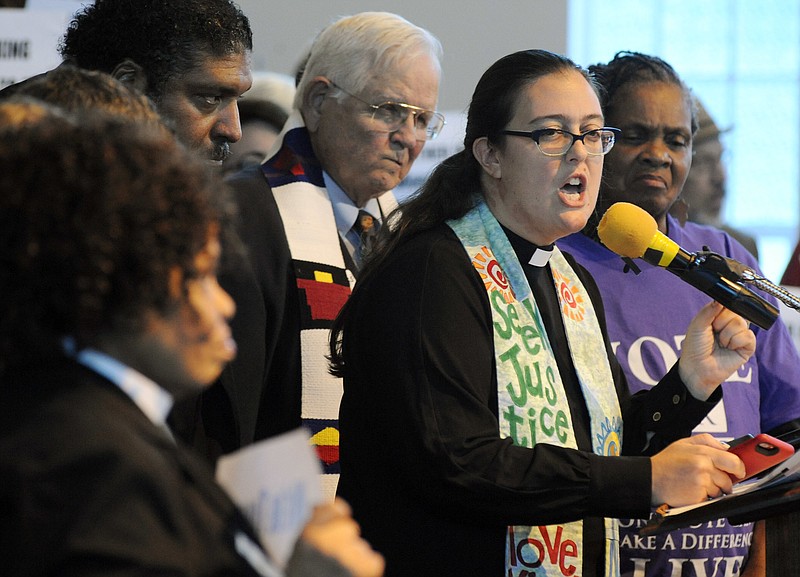 The Rev. Liz Theoharis, co-director of The Poor People's Campaign, speaks at a rally in opposition to Republican U.S. Senate candidate Roy Moore at a church in Birmingham, Ala., on Saturday, Nov. 18, 2017.
