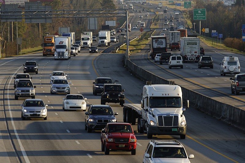 Vehicles travel along I-75 near Exit 1 on Friday, Nov. 17, 2017, in East Ridge, Tenn. AAA predicts that 50.9 million Americans will travel over the Thanksgiving holiday.