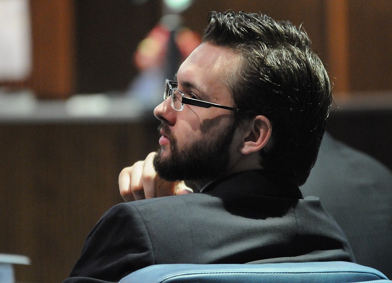 Defendant Nathan Lalone listens as a jury is picked for his trial Tuesday in Judge Rebecca Stern's courtroom. Prosecutor Brian Finlay questioned possible jurors.