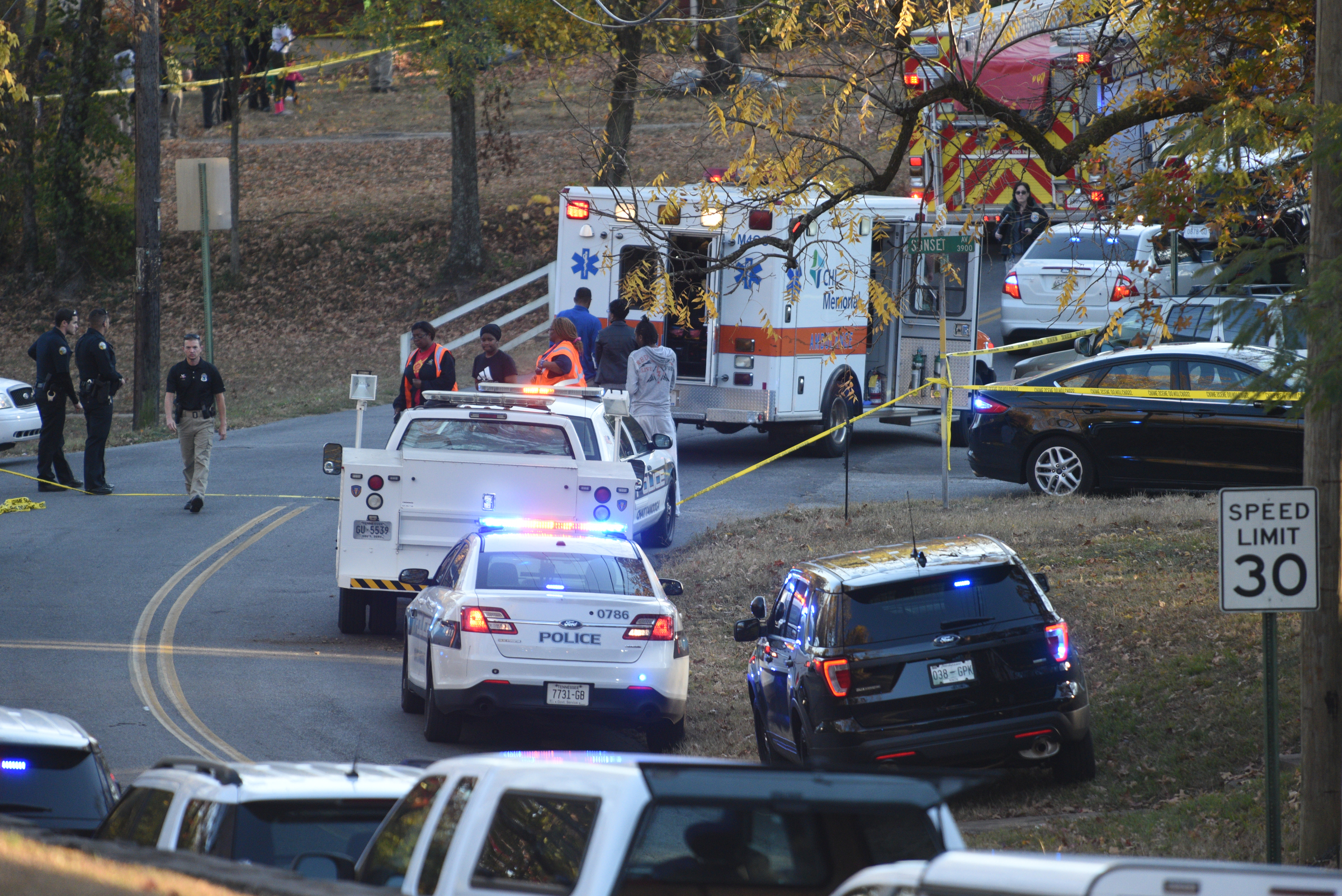 Emergency personnel work at the scene of a school bus wreck involving multiple fatalities on Talley Road in Chattanooga, Tenn., Monday, Nov. 21, 2016. The crash occurred around 3:20 p.m.