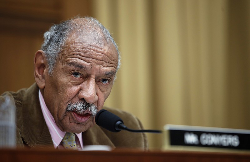 In this April 4, 2017, file photo, Rep. John Conyers, D-Mich., speaks during a hearing of the House Judiciary subcommittee on Capitol Hill in Washington. Buzzfeed, a news website, is reporting that Conyers settled a complaint in 2015 from a woman who alleged she was fired from his Washington staff because she rejected his sexual advances. Calls to Conyers and his office seeking comment were not immediately returned Monday, Nov. 20. (AP Photo/Alex Brandon, File)