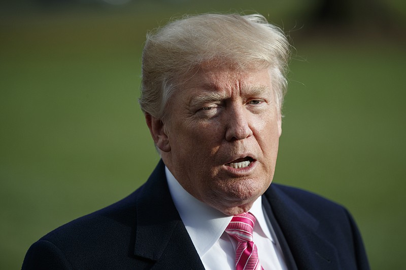 President Donald Trump speaks to reporters before leaving the White House, Tuesday, Nov. 21, 2017, in Washington for a Thanksgiving trip to Mar-a-Lago estate in Palm Beach, Fla. (AP Photo/Evan Vucci)