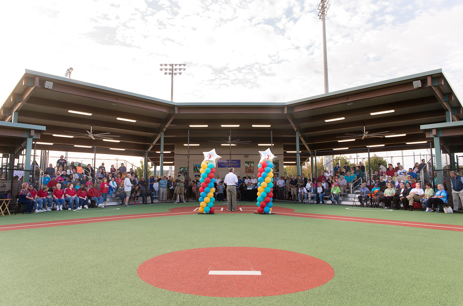 Mike St. Charles welcomes everyone to the grand opening of the Miracle League facility.