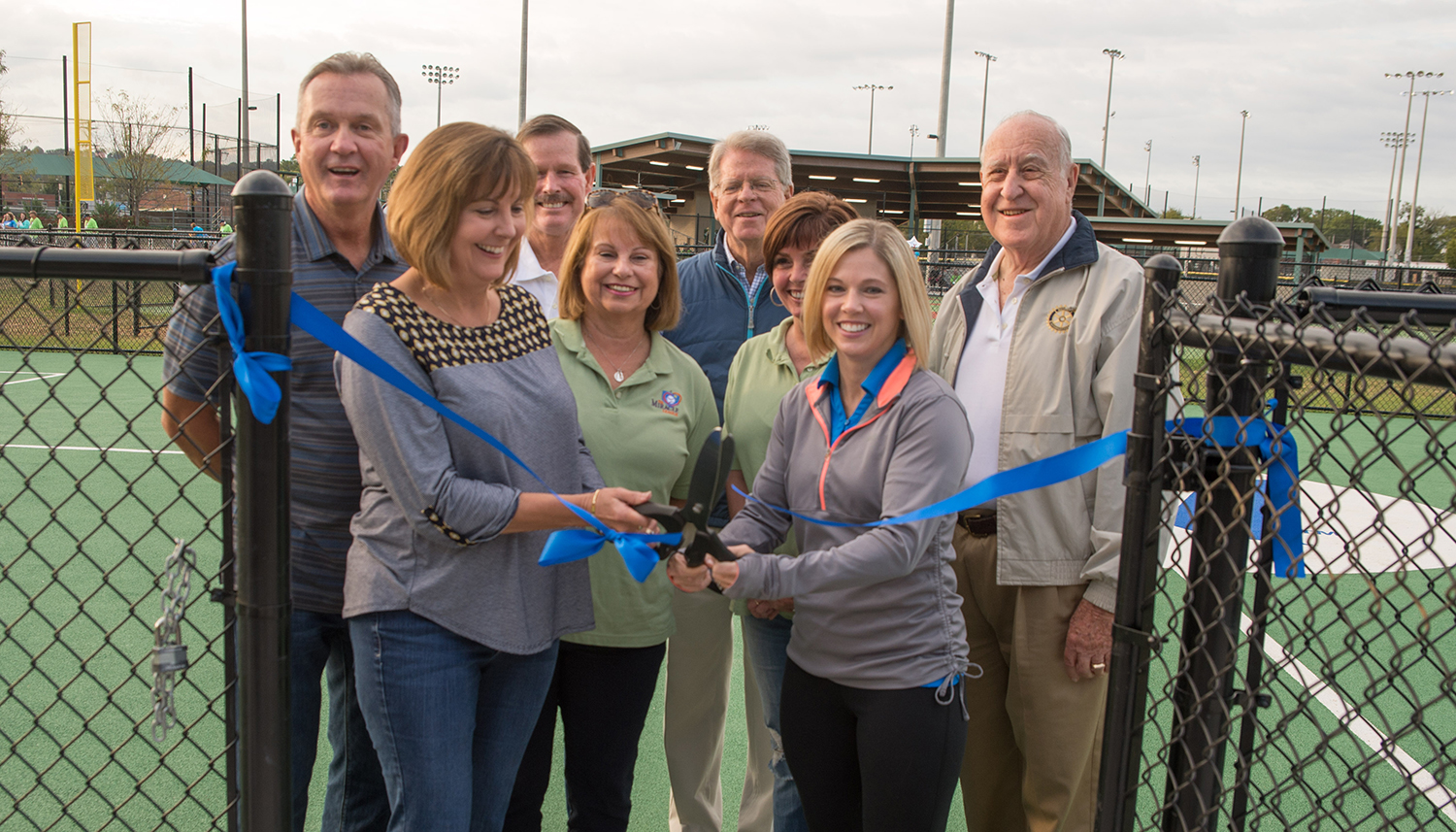 The ribbon is cut, officially welcoming people to the multi-sport field.
