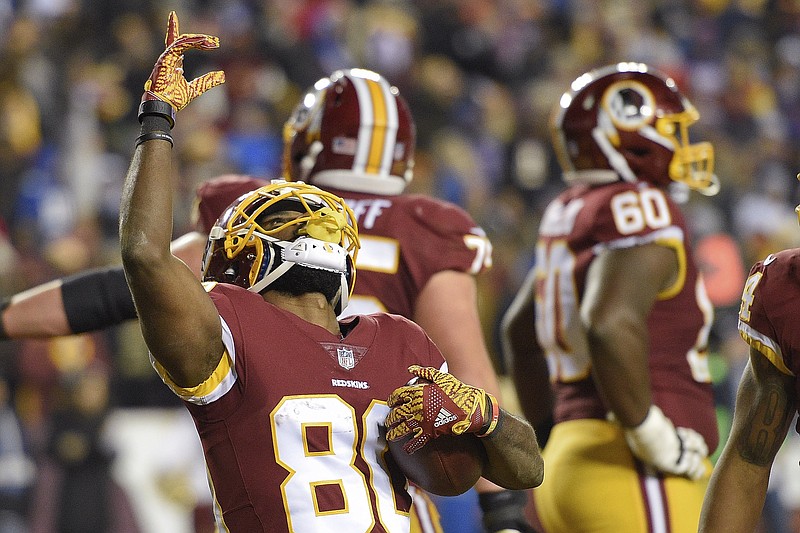 Washington Redskins wide receiver Jamison Crowder (80) celebrates his touchdown catch during the second half of an NFL football game against the New York Giants in Landover, Md., Thursday, Nov. 23, 2017. (AP Photo/Nick Wass)