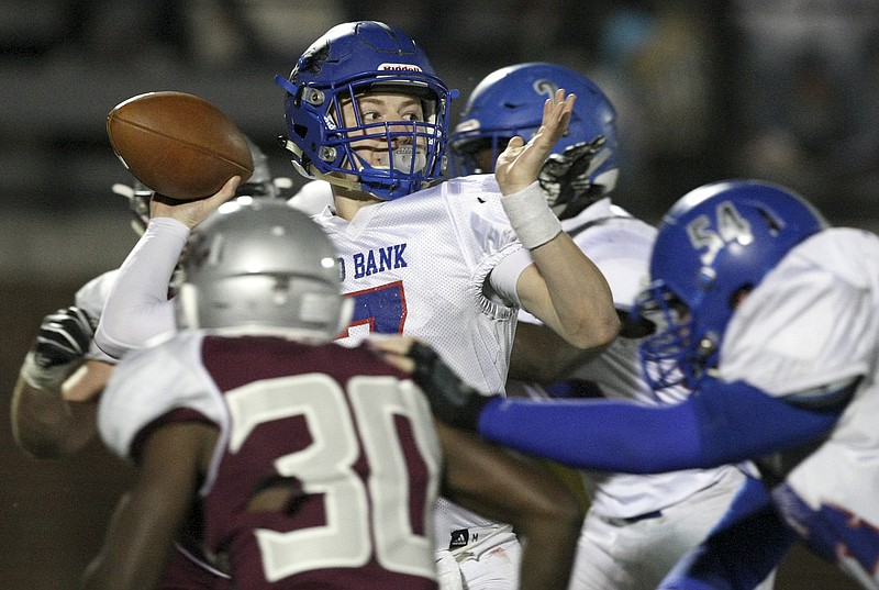 Red Bank's Madox Wilkey (7) goes to pass against Alcoa during the TSSAA Class 3A semifinals at Alcoa High School's Goddard Field on Friday, Nov. 24, 2017 in Alcoa, Tenn.
