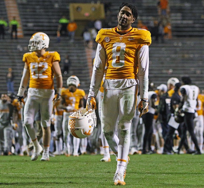 University of Tennessee's Justin Martin (8) walks off the field following the Vols 24-42 loss to the Commodores Saturday, Nov. 25, 2017 at Neyland Stadium in Knoxville, Tenn.