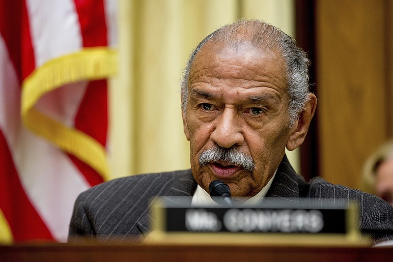 In this May 24, 2016, file photo, Rep. John Conyers, D-Mich., ranking member on the House Judiciary Committee, speaks on Capitol Hill in Washington during a hearing. Conyers said he is stepping aside as the top Democrat on the House Judiciary Committee amid a congressional investigation into allegations he sexually harassed female staff members. In a statement Sunday, Nov. 26, 2017, Conyers said he denies the allegations and would like to keep his leadership role on the panel. (AP Photo/Andrew Harnik, File)