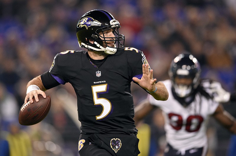 Baltimore Ravens quarterback Joe Flacco throws to a receiver in the first half of an NFL football game against the Houston Texans, Monday, Nov. 27, 2017, in Baltimore. (AP Photo/Nick Wass)