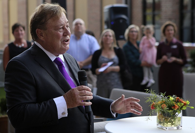 Boyd Simpson, head of The Simpson Organization, speaks during the official opening of Market City Center on Thursday, Sept. 14, in Chattanooga, Tenn.