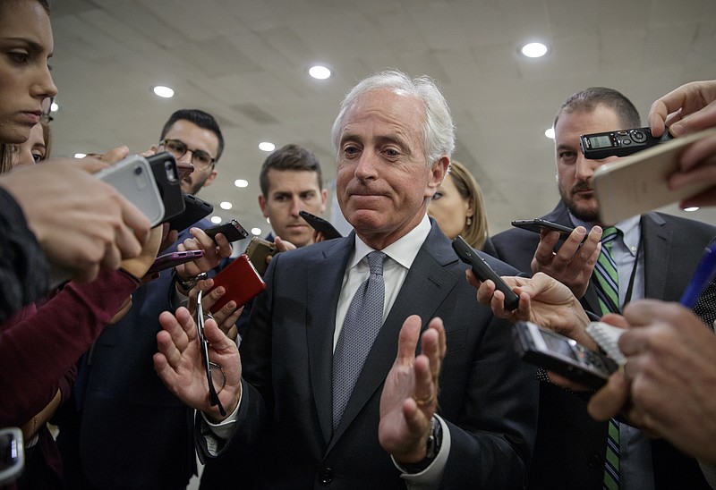 Senate Finance Committee member Bob Corker, R-Tenn., center has been insistent the tax bill currently being debated in Congress doesn't add to the deficit.