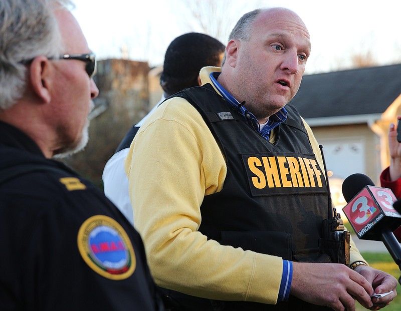 Bradley County Sheriff Eric Watson gives a press briefing Tuesday, Nov. 28, 2017 following a hostage situation in Cleveland, Tenn. Two suspects were taken into custody following the incident. 