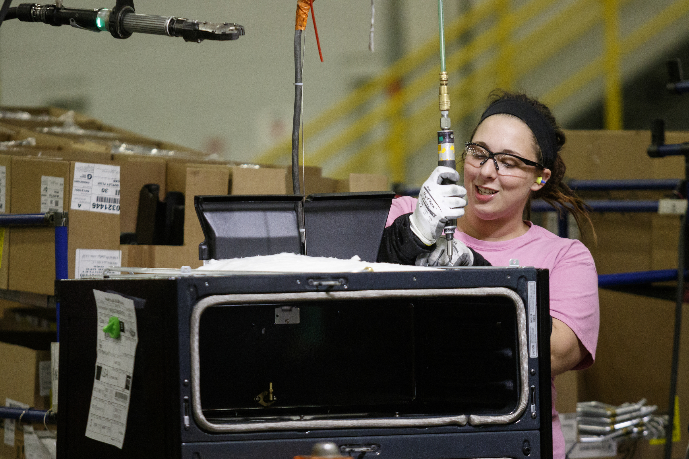 A worker assembles an appliance at the Whirlpool manufacturing plant on Thursday, Oct. 6, 2016, in Cleveland, Tenn. The plant gave tours of its facility for National Manufacturing Week.