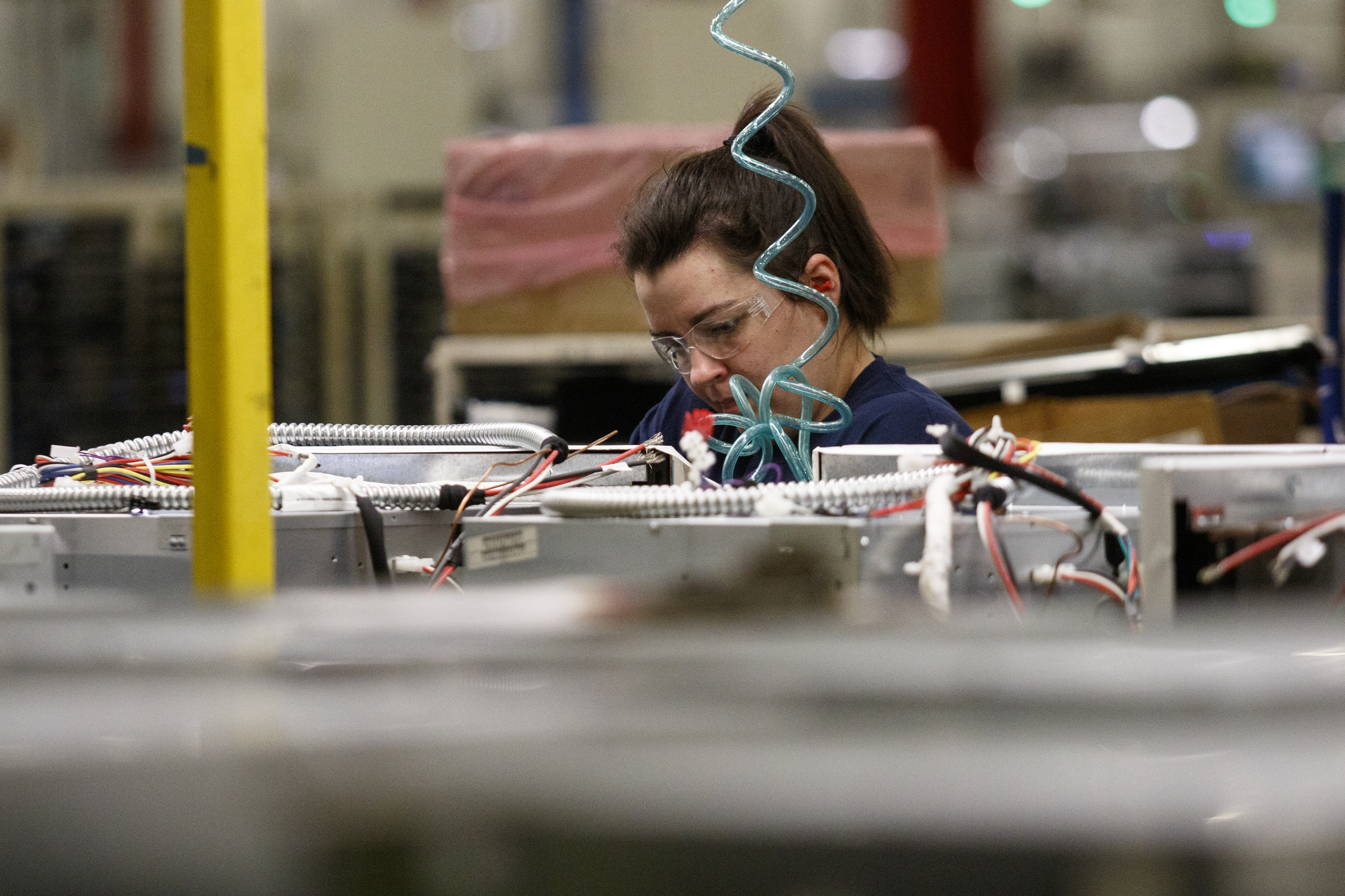 A worker assembles appliances at the Whirlpool manufacturing plant on Thursday, Oct. 6, 2016, in Cleveland, Tenn. The plant gave tours of its facility for National Manufacturing Week.