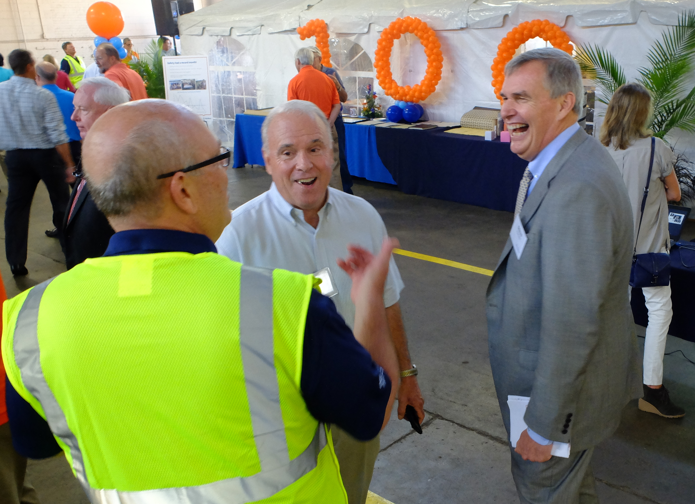WestRock (Chattanooga) General Manager Pat Cowan, left, talks with former GM Rusty Kimball and CEO Steve Voorhees Friday prior to the plants 100th birthday ceremonies Friday.