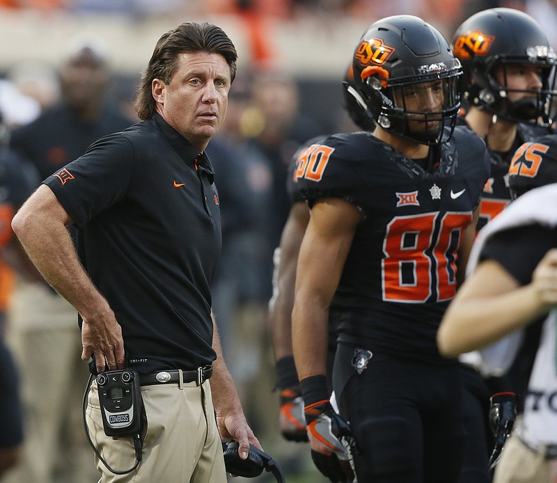 Oklahoma State head coach Mike Gundy during an NCAA college football game against Oklahoma in Stillwater, Okla., Saturday, Nov. 4, 2017. Oklahoma won 62-52. (AP Photo/Sue Ogrocki)